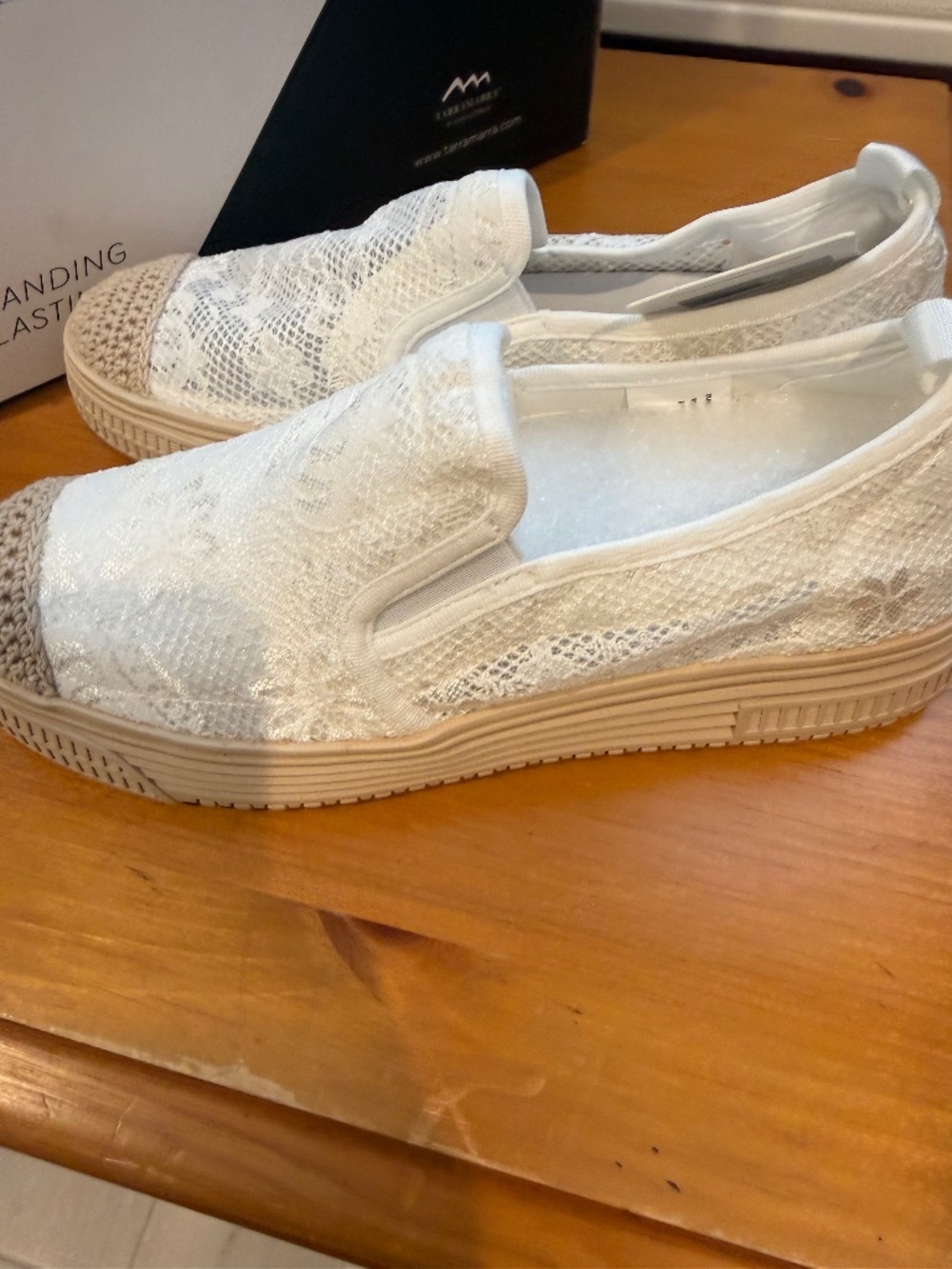 white Womans lace and espadrilles style show